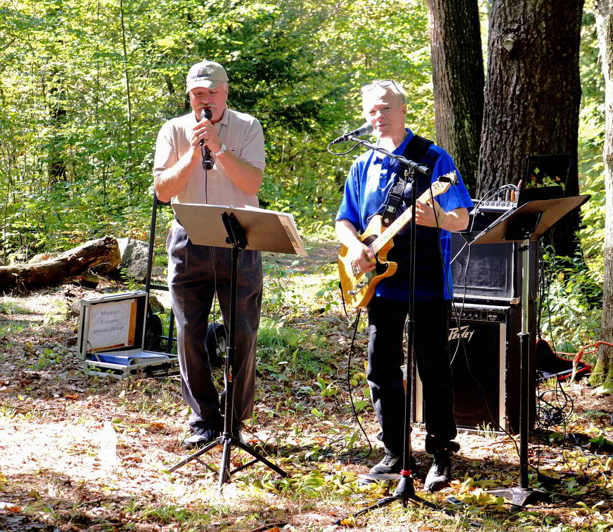 2-person band playing at springdale mill celebration